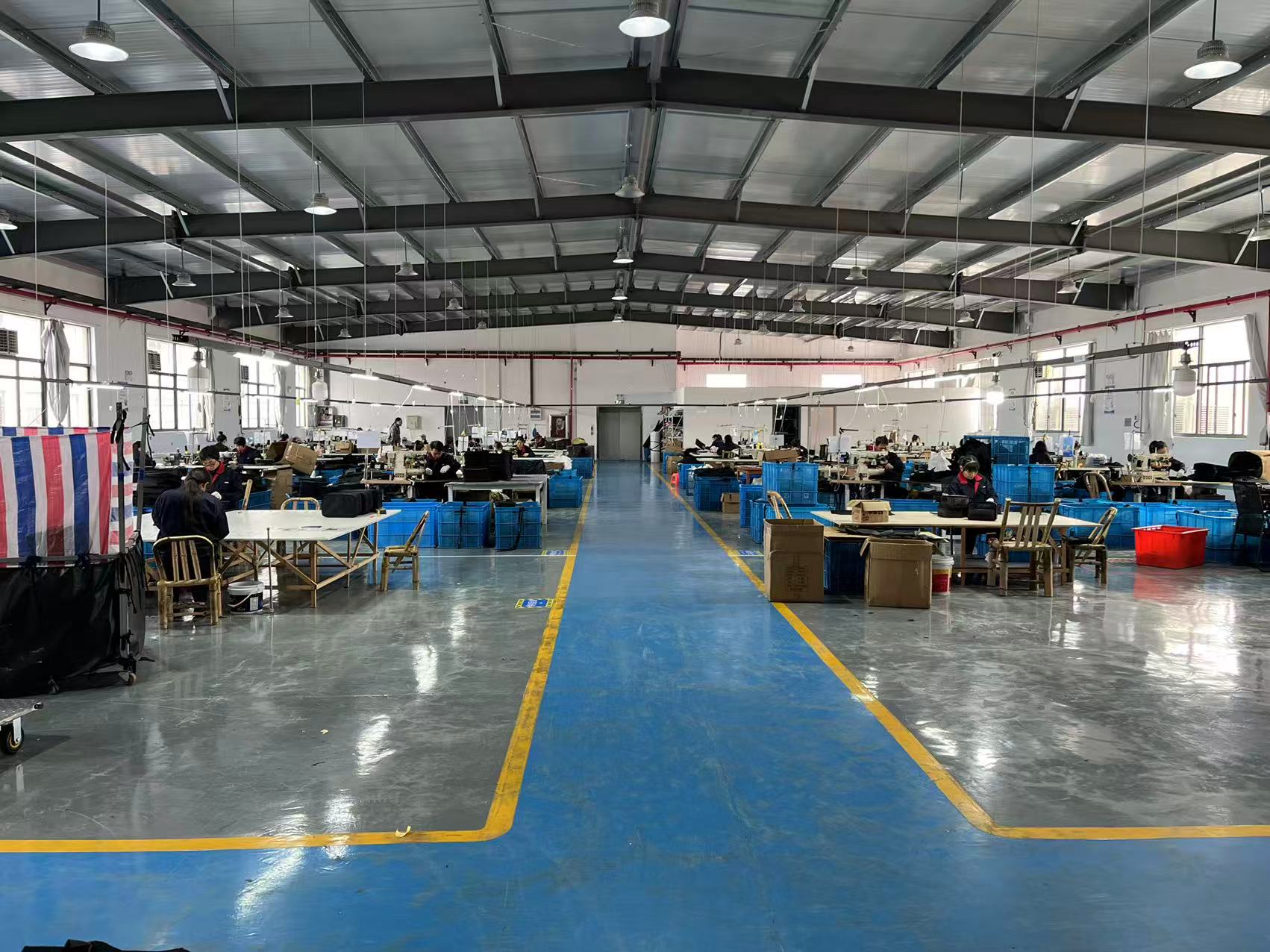 Wide view of CHAMPO's active sewing workshop